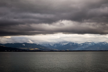 Bodensee lake with Alps mountains in the background. View from Lindau in Germany.