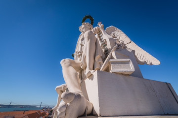 Glory rewarding Valor and Genius sculpture on the roof of Arco da Rua Augusta in Lisbon, Portugal