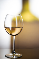 A glass of white wine and apple juice