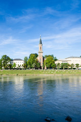 Obraz premium A Wonderful Church in Salzburg along the riverside
