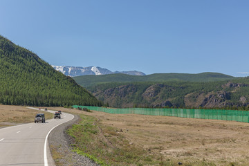 winding roadto Altai Mountains, Altai region, Siberia, Russia.