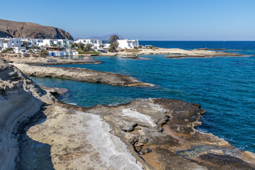 Houses, Rocks and cliffs in Pollonia beach