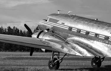 Old propeller airplane on runway