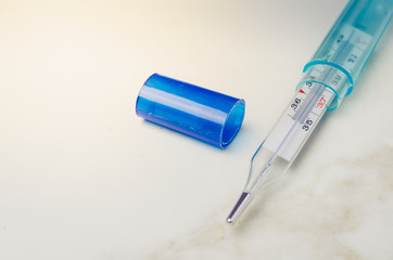 Obraz premium thermometers on white background/thermometer are placed on a white background. Copy space and top view