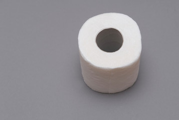  Toilet paper on grey background.