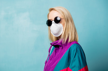 Blonde woman in face mask and 90s style clothes