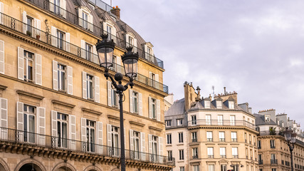 Fototapeta na wymiar Paris, the beautiful Rivoli street, typical facade and windows