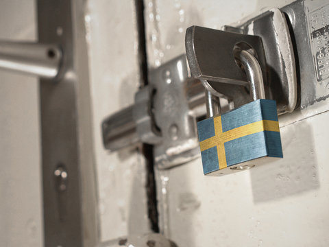 A bolted door secured by a padlock with the national flag of Sweden on it.(series) - Powered by Adobe
