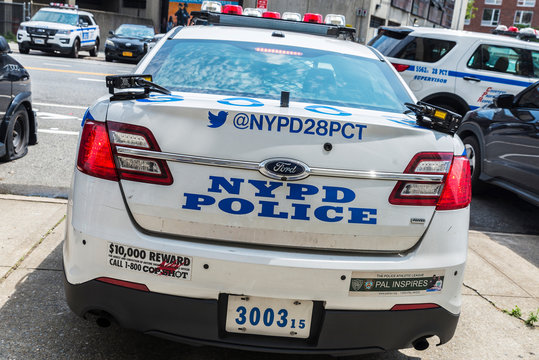 Police car parked on street in New York City, USA