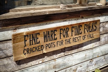 Photographs on signs in Pioneer Town.