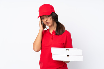 Young Pizza delivery girl over isolated white background with headache