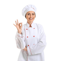 Portrait of female chef on white background