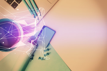 Start up theme drawing over computer on the desktop background. Top view. Double exposure....