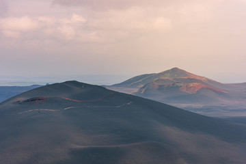 Fototapeta na wymiar Dramatic views of the volcanic landscape. Kamchatka Peninsula.