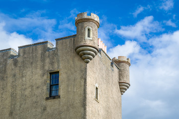 Fototapeta na wymiar Towers of Dunvegan Castle close view. Island of Skye, Inner Hebrides, Scotland.