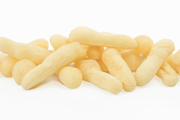 Traditional Brazilian starch biscuit called biscoito de polvilho isolated in white background