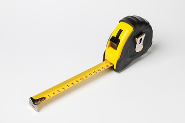 black and yellow flexometer isolated on white background