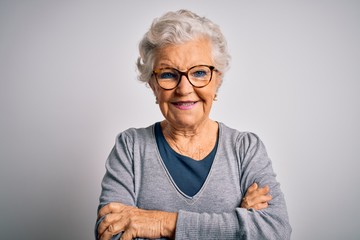 Senior beautiful grey-haired woman wearing casual sweater and glasses over white background happy...