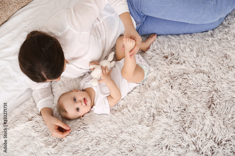 Sticker Happy mother with cute little baby at home