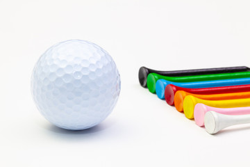 Golf set - golf ball and wooden tees.