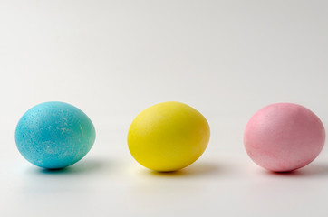 Painting Easter eggs isolated on white background