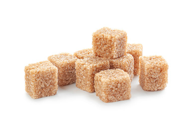 Cubes of sweet sugar on white background