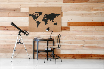 Interior of modern room with telescope