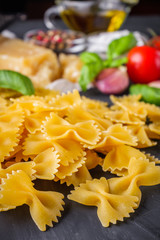 concept of traditional italian pasta with tomatoes and basil