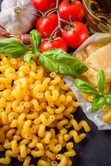 concept of traditional italian pasta with tomatoes and basil