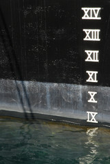 The Roman number as indicator of water level on the body of the ship.