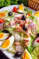 tuna salad on dark wooden rustic background