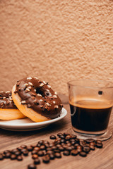 americano and chocolate donuts