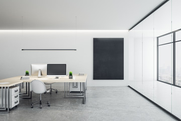 Contemporary coworking office with blank poster
