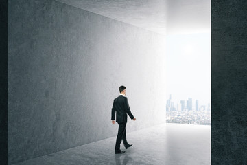 Fototapeta premium Businessman in interior with city view