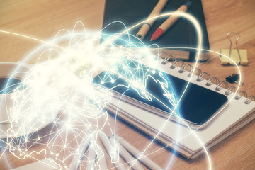 Double exposure of financial theme drawing and cell phone background. Concept of business