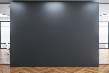 Blank gray wall in modern office interior.