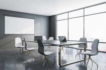Contemporary meeting room interior with blank tv screen