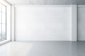 Contemporary interior with blank brick wall
