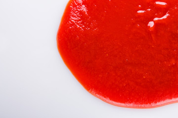 fresh natural tomato ketchup on a white background