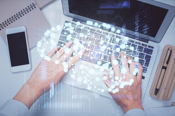 Double exposure of woman working on computer andhuman brain hologram drawing. Top View. Ai concept.