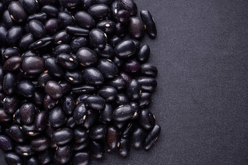fresh organic natural beans on black background