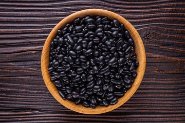 Fresh organic natural beans on wooden rustic background