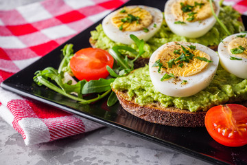 tasty and nutritious avocado sandwich and boiled egg