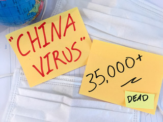 China virus Coronavirus COVID-19 infection medical cases and deaths . COVID respiratory disease influenza statistics hand written on surgical mask and earth globe background.