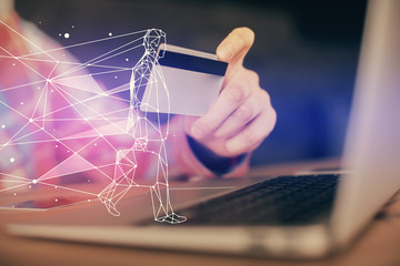 Double exposure of man hands holding a credit card and creative drawing. Start up and E-commerce pay on-line concept.