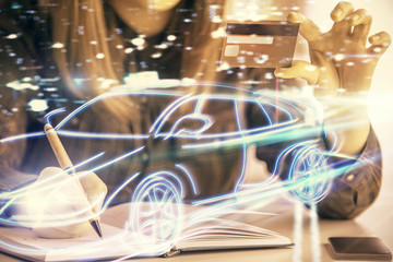 Multi exposure of woman on-line shopping holding a credit card and taxi drawing. Technology concept.