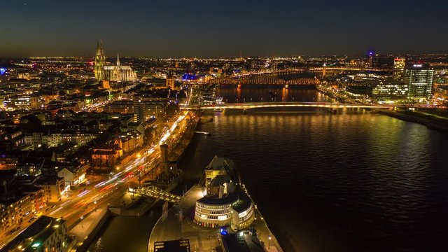 Aerial timelapse of Cologne city at night, Germany