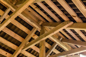 roof of a village house high wooden beam construction pattern background