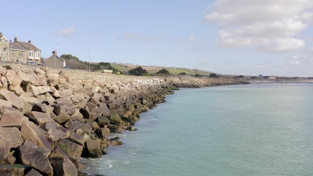 Sea Defence Walls Protecting the Land Along A Coastline