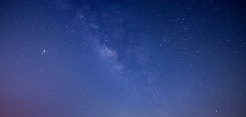 Panorama blue night sky milky way and star on dark background.with noise and  grain.Photo by long exposure and select white balance.